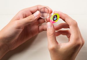 How to Make Bottle Cap Earrings Using Epoxy Sticker