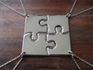 4 Piece Puzzle Necklace
