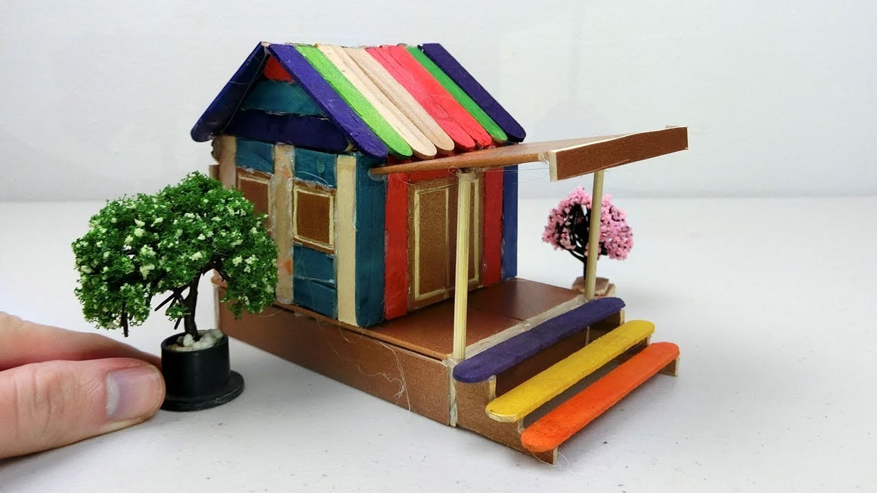 doll house made of popsicle sticks