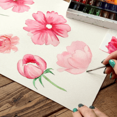 Painting flowers with pink paint